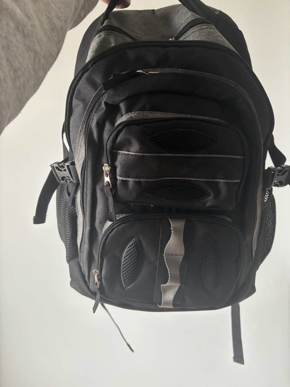 Black Multi-Pocket Backpack in good condition